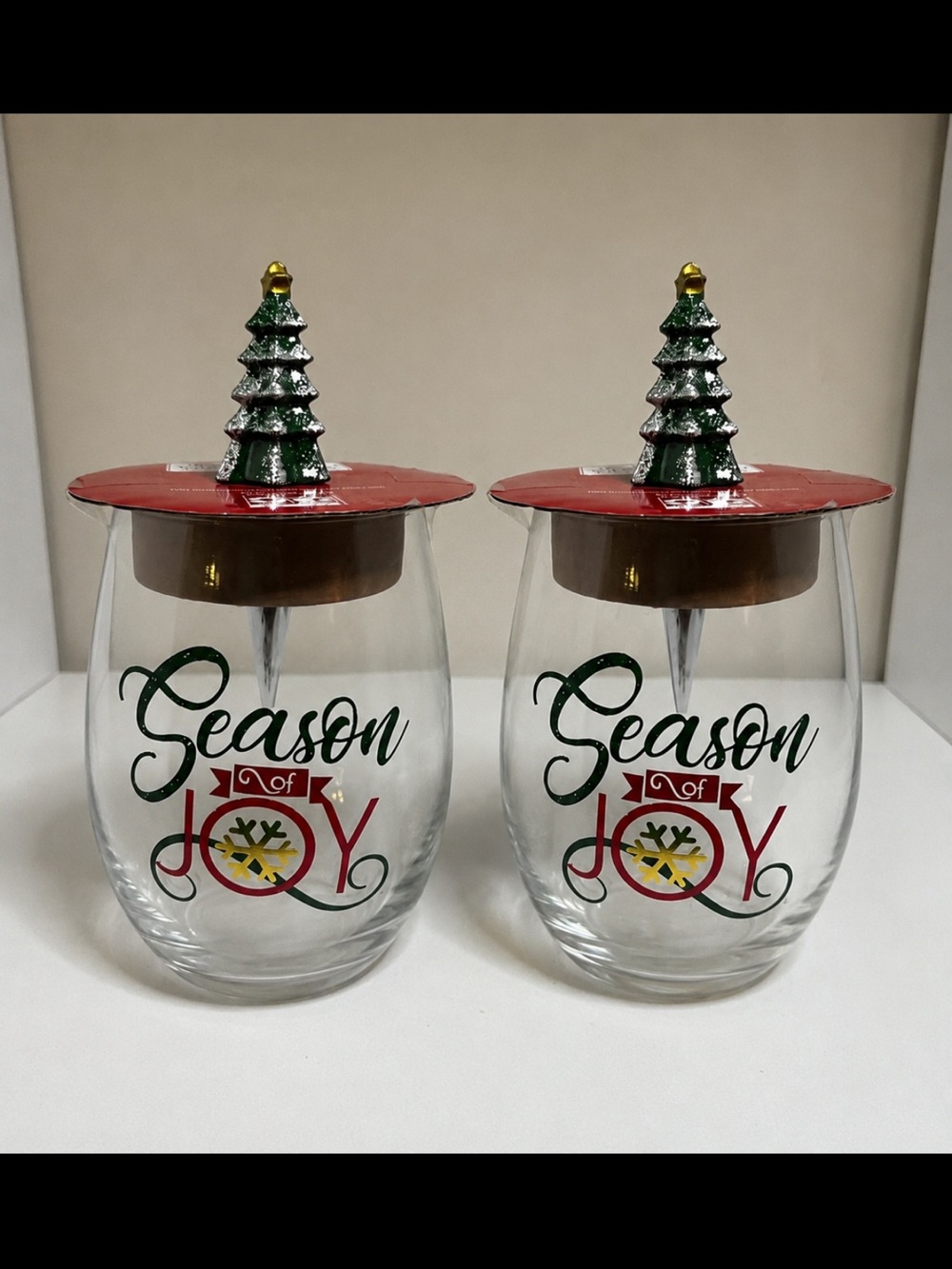 Holiday Time Clear Glass Tumblers with Tree Bottle stopper. - Set of 2